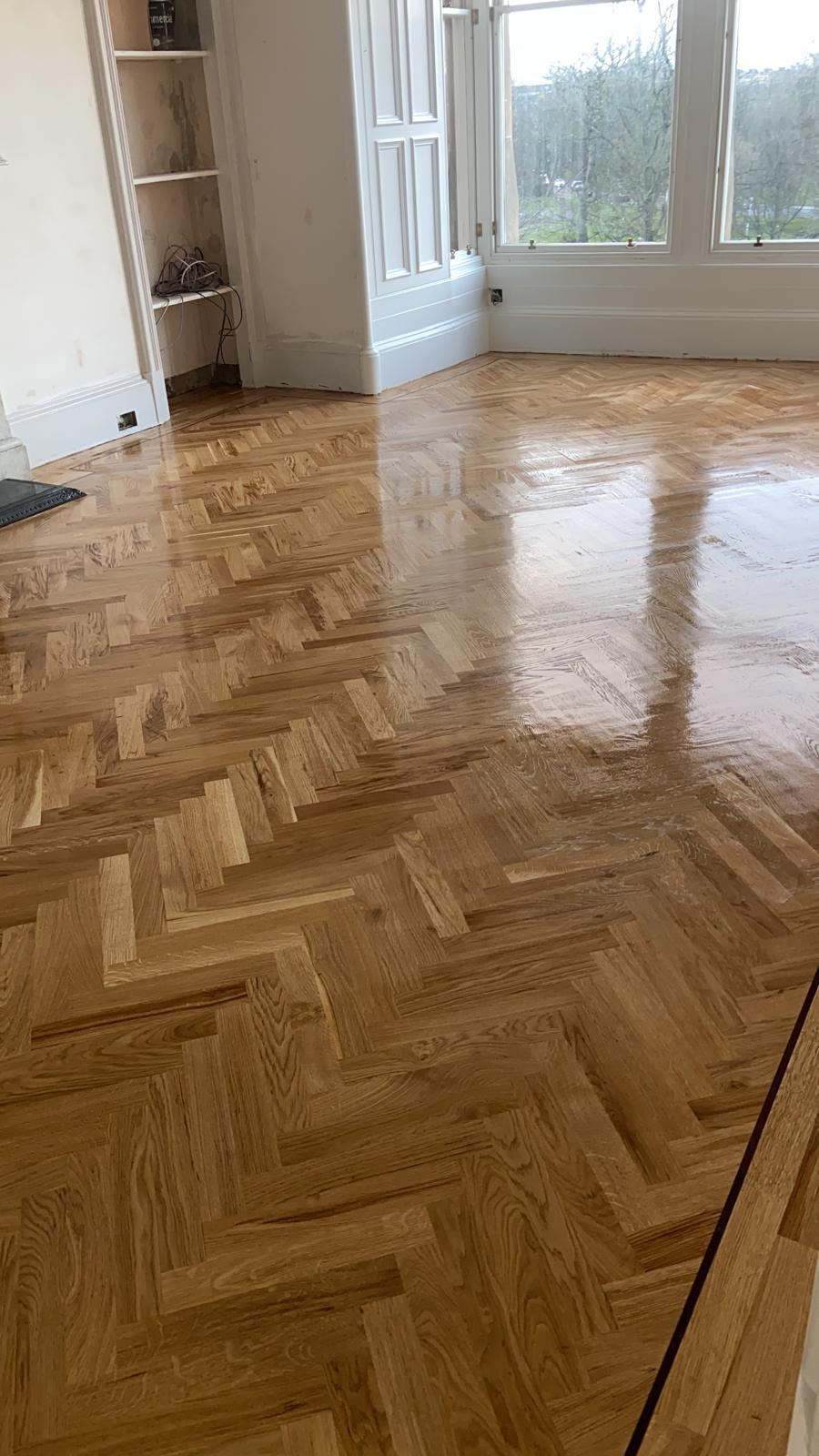 Glossy restored herringbone floor