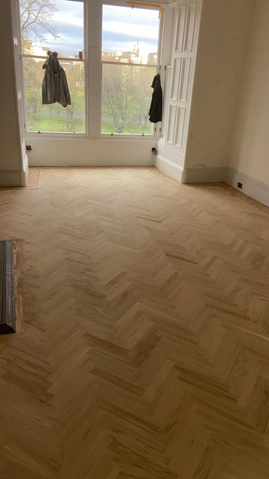 Parquet floor by a window